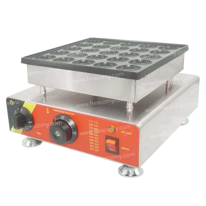 The Dorayaki Mini 25 Holes Machine Electric FNP-542 includes multiple round molds, precise temperature control knobs, and convenient power switches on the front panel.