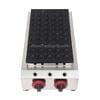The Dorayaki Mini 50 Holes Machine Gas FNP-548 features striking red-and-black knobs and a grid with 50 round indentations for ideal cooking.