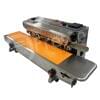 The Auto Sealing Machine Stainless Steel Premium FR770 is an industrial heat sealer with a conveyor belt, equipped with control knobs and switches for continuous packaging operations, ensuring efficient and reliable sealing every time.