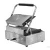 A Commercial Grill Panini Sandwich Big Flat Single Electric Machine, featuring an open top design, showcases its non-stick grilling surfaces and side vents. The black handle complements its functionality, while the plugged-in power cord ensures it's ready for making a perfect large flat sandwich.