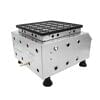 The [Business Package] 25 Holes Mini Pancake Gas Machine features a metal construction with a square patterned top and multiple circular holes on the sides, supported by four black feet.
