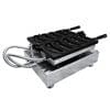 The Smiley Banana Waffle Electric Machine FNP-439 is a metal fish-shaped waffle maker with six molds and two sturdy handles on a sleek stainless steel base, perfect for crafting delightful waffles with ease.