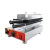 The Smiley Banana Waffle Electric Machine FNP-439 is a versatile unit with a red panel, stainless steel sandwich press, and sleek black handles and control knobs, ideal for grilling sandwiches, panini, or creating delightful smiley banana waffles.
