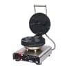 The Waffle Ice Cream Bowl Machine Electric FNP-619 FR-29A boasts three round molds on a sleek stainless steel base, with a handle and control knobs, perfect for crafting delightful waffle ice cream bowls.