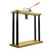 The Spaghetti Ice Cream Press Maker ICE-Noodle features a wooden handle and metal components, stylishly displayed on a wooden base with sleek black metal legs.