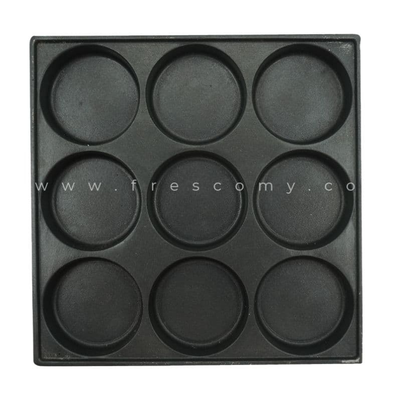 The 6 Holes Waffle Telur Burger Mould Spare Part Mold is a black, square tray with six round indentations, perfect for making homemade Waffle Telur or use as a spare mold.