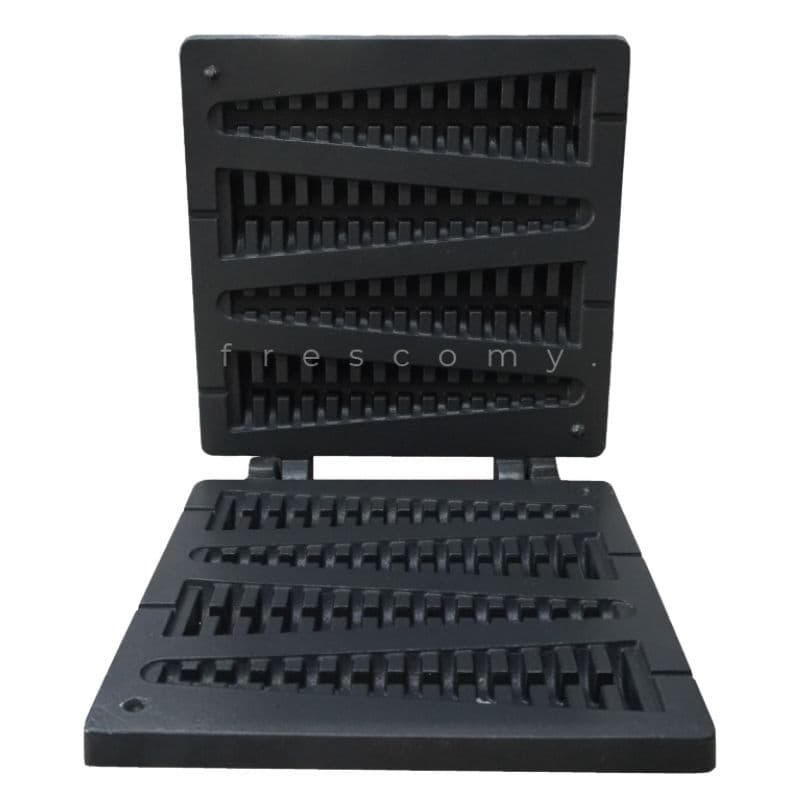A Waffle Plate Christmas Tree Mould Spare Part Mold, black cast iron and square-shaped, is shown open to reveal its grooved cooking surfaces.